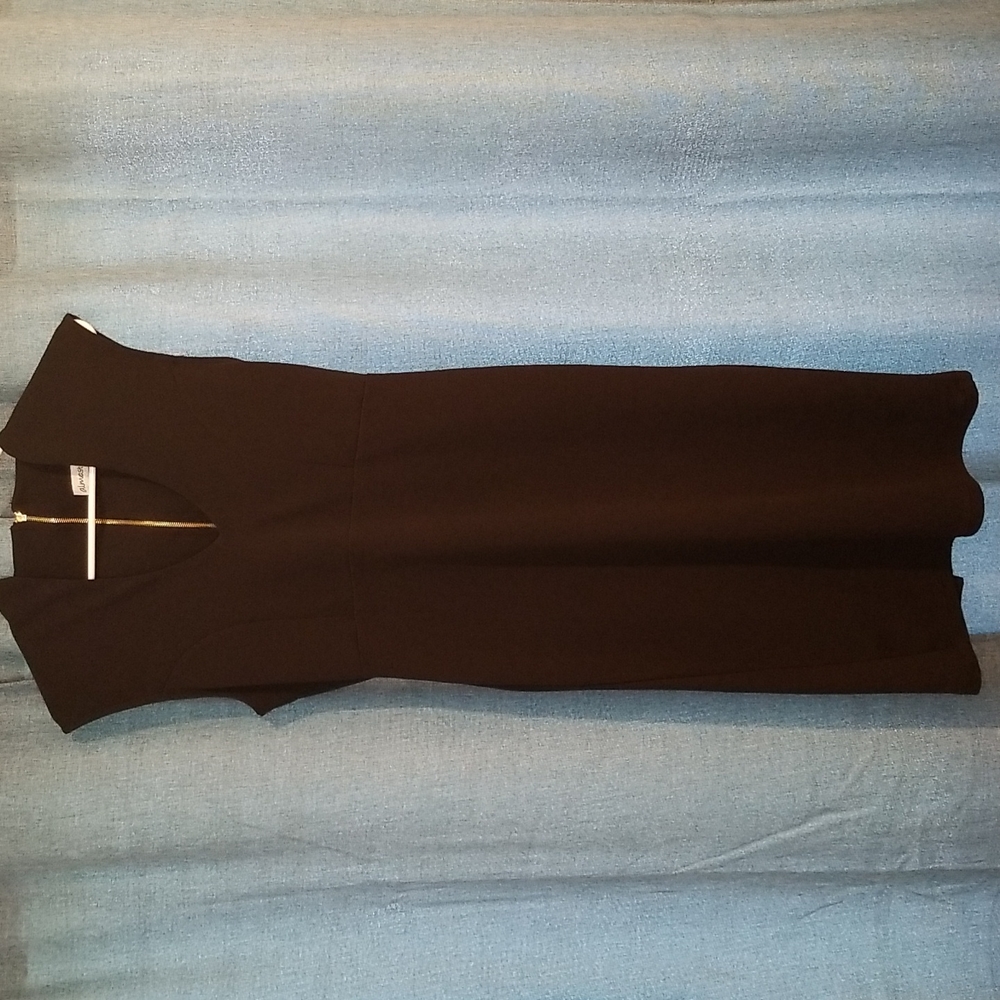 NEVER WORN! Beautiful black dress, sexy!